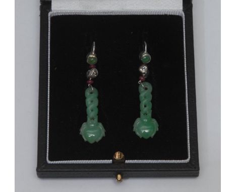 A pair of Chinese jadeite, diamond and ruby earrings, the carved jade droplet approx 26mm long, suspended from a ruby bead, b