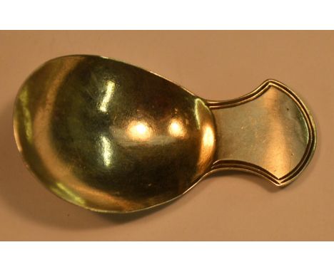 A George III silver caddy spoon, axehead lug handle, 6.5cm long, John Shea, London 1804