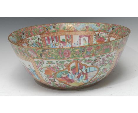 A Chinese famille verte circular punch bowl, typically painted in polychrome enamels with traditional Court and domestic figu