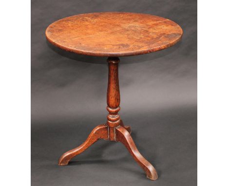 A George III oak tripod occasional table, of small proportions, circular tilting top, turned column, cabriole legs, 71cm high