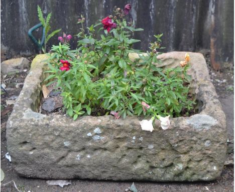 A 19th century  Derbyshire gritstone  trough, 19cm high, 39cm wide, 49cm deep