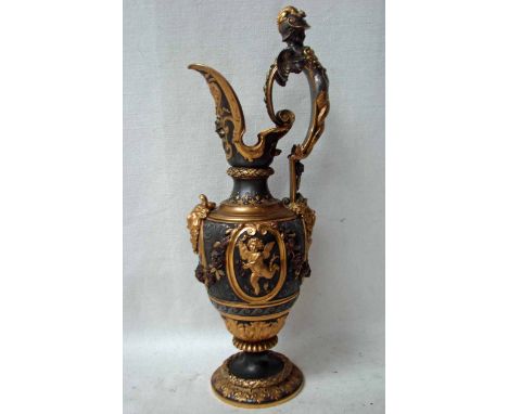 A good quality 19th century Cellini style parcel gilt Trophy Ewer of typical baluster form, caryatid handle as a soldier with