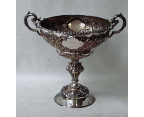 A large Edwardian silver twin handled Trophy of typical chalice form, circular bowl on knopped stem and stepped circular foot