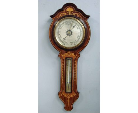 An unusual late 19th/early 20th century Banjo style Barometer in an upside down layout, rosewood and marquetry inlaid with 20