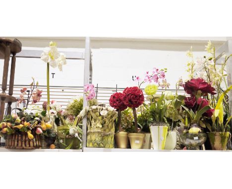 A quantity of faux floral arrangements contained within various glass or ceramic planters, to include faux orchids and others