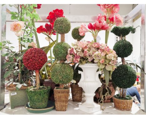 A quantity of faux plant arrangements the majority contained within ceramic planters, to include topiary bushes, roses etc.

