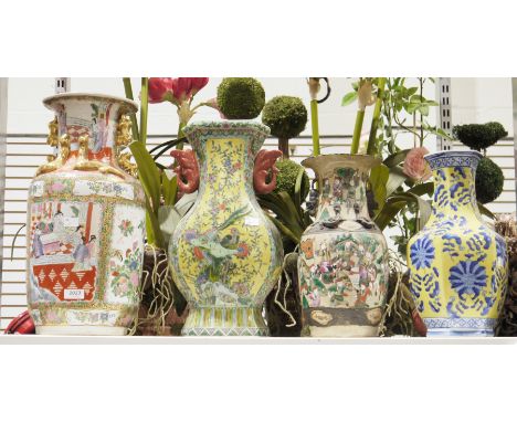 Four ceramic vases to include a s
Satsuma style vase decorated with floral panels and panels of nobles in court, a yellow Jap