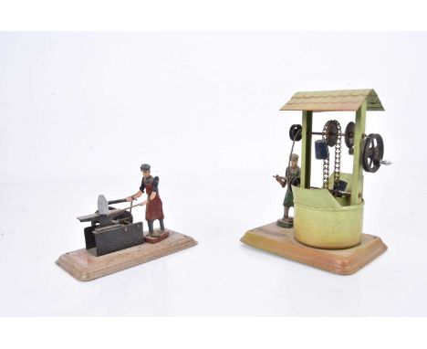 Fleischmann Live Steam operated Well and Blacksmiths with workmen, Well in green with workman turning handle and Blacksmiths 