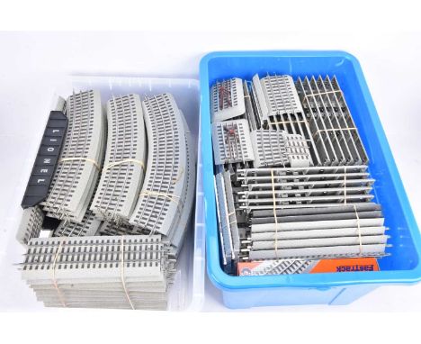 Large collection of Lionel 0 Gauge Fast Track including Points, boxed, Operating Track, electric uncoupling Track, 90 Deg Cro