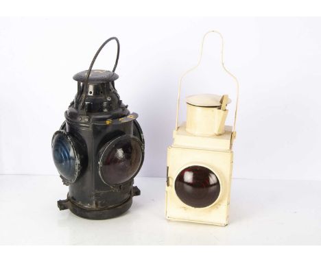 Canadian Railway Crossing Lamp and BR Railway Lamp, a Canadian lamp of cylindrical form with three blue lenses (two cracked) 