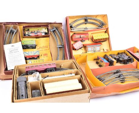 Two Mettoy 0 Gauge 3-Rail Saftylectric battery operated Train Sets and two Brimtoy clockwork Trains Sets, Mettoy, early set c