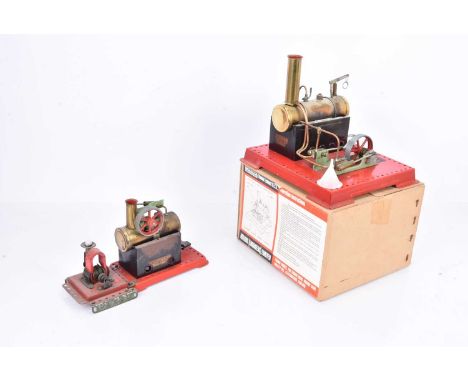 Mamod Live Steam SE3  Steam engine and SE1 Steam Engine with attachment, SE 3 with twin cylinder and flywheel on red base, in