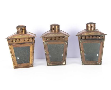 GWR Swindon Copper Wall Mounted Lanterns, three sheet copper lanterns of tapering form, with pierced vents above brass plaque