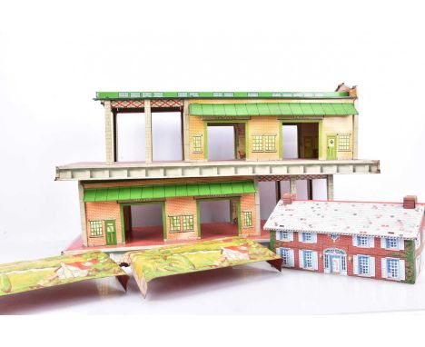Marx 0 Gauge large Tinplate Freight Depots and other Accessories, pair of Freight Terminal Depots, one with some discolourati