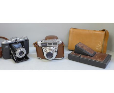 Three cameras, two Kodak and a Polaroid 