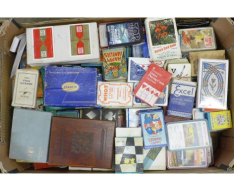 A box of vintage 20th Century playing cards 
