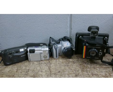 Four cameras, Pentax, Polaroid, Minolta and Panasonic **PLEASE NOTE THIS LOT IS NOT ELIGIBLE FOR POSTING AND PACKING** 