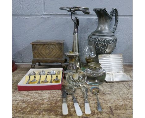 A pewter ewer, plated posy vase, cigarette case and cutlery and a cigarette box, serpentine sun dial, glass and brass ink wel