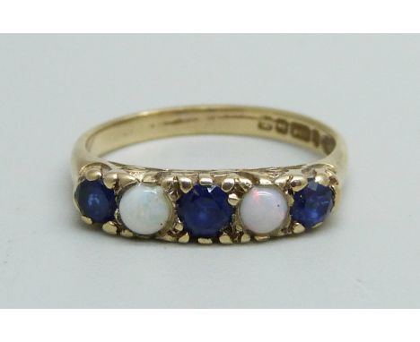 A 9ct gold, sapphire and opal ring, 2.1g, K 