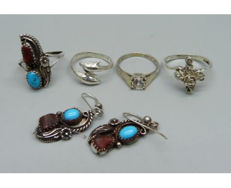 A silver stone set ring, Q, and matching earrings set and three silver rings, M, N and Q 