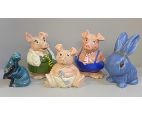 Three Wade Nat West piggy banks, a Poole otter and a Sylvac rabbit, rabbit a/f 
