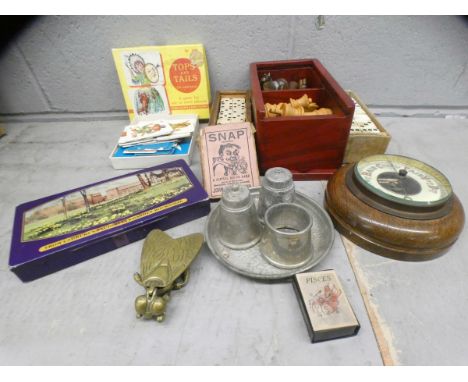 A box of assorted items including a chess set, two sets of dominoes, brass ashtray, barometer, pewter, etc. **PLEASE NOTE THI