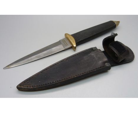 A dagger marked Especial Comando, with scabbard, (tip of blade a/f) 