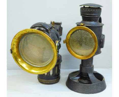 A Miller bicycle or motorcycle carbide lamp and one other lamp 