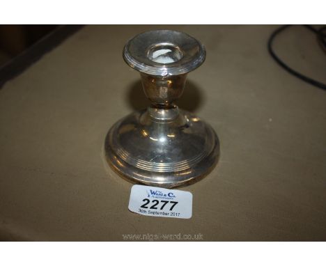 A dumpy Silver Candlestick