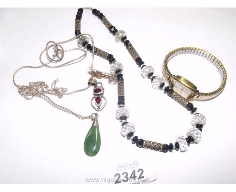 A ladies Sekonda wristwatch, jade pendant, etc
