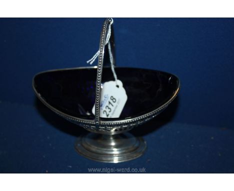 A pretty boat shaped pierced Silver Sucrier with blue glass liner, Sheffield 1908/1909, Makers      Thomas Bradbury & Sons Lt
