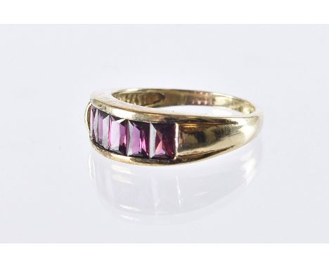 A modern 9ct gold and five stone ring, five purple garnets in channel setting, 4g and size R 1/2 