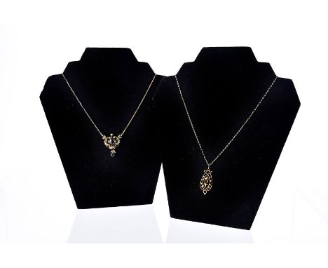 An Edwardian gold amethyst and seed pearl pendant on chain, together with another similar example with fine chain necklace, l