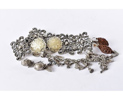 A 19th century hair and gilt metal watch chain, the gilt mounts modelled as clasped hands, also a silver charm bracelet, a pa