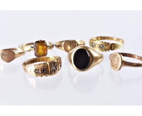 Seven various gold rings, including a Victorian 15ct gold and diamond example, lacks a stone, 2.2g, a Victorian 18ct gold sap