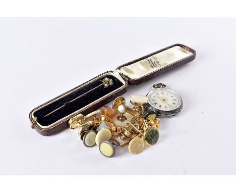 An Edwardian 15ct gold stick pin in case, together with a silver lady's fob watch and several cufflinks and tiepins (parcel) 