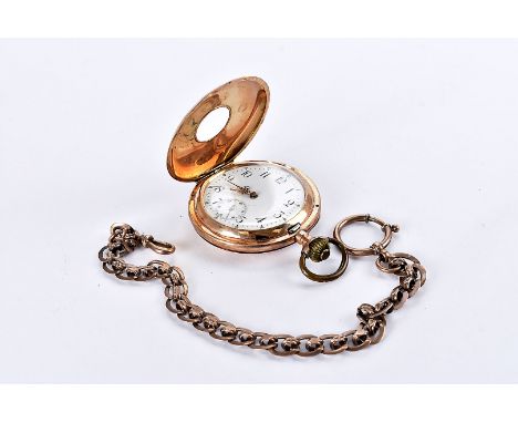 A vintage continental gold half hunter pocket watch and chain, with black enamel Roman numerals to outer, marked 585 to cover