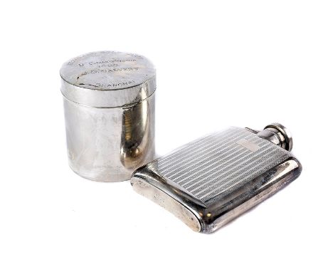 A 1950s sterling marked hipflask and tea canister, the flask with engine turned bands, and the canister engraved to cover fro