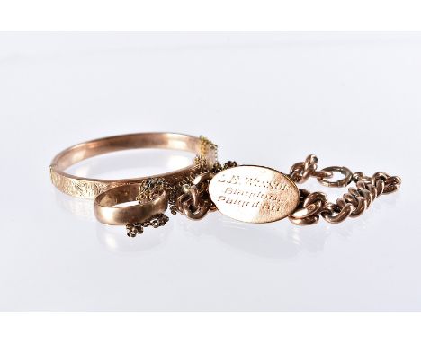 A group of six Victorian and later 9ct gold and yellow metal jewellery items, including a bangle, wedding band, a locket pend
