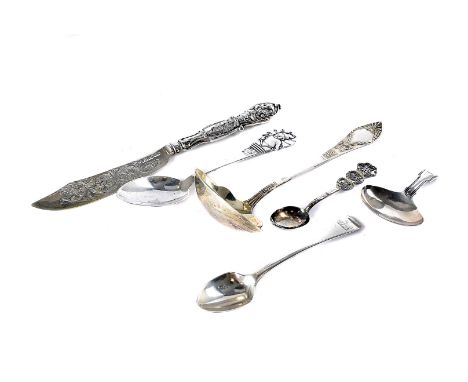 Six Georgian and later silver items, including a caddy spoon by Joseph Willmore, a Victorian teaspoon, a Danish silver Christ