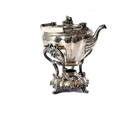 An interesting Victorian silver plated kettle on stand, the large teapot with swing handle having ivory handle, one of the pi