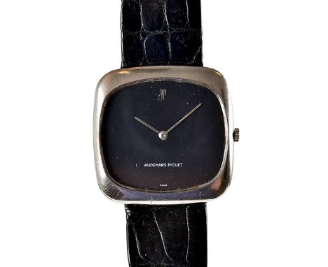 A 1970s 18ct gold Audemars Piguet gentleman's evening dress watch, the squared case with black dial, hallmarked, on original 