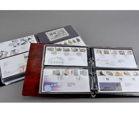 A collection of First Day Covers and Presentation Packs, in ten ring binder albums, FDC's date from the 1960s to the 2000s, w