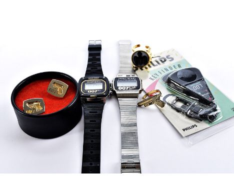A 1980s James Bond digital wristwatch and related 007 items, the stainless steel For Your Eyes Only watch with box, together 