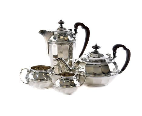 A four piece George V silver tea set, possibly by FC, Sheffield 1929, in the Art Deco style with teapot, hot water, sugar bas