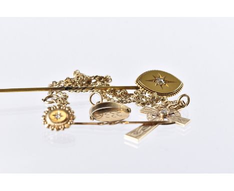 Two Victorian and later gold and diamond stick pins, together with a 9ct gold Celtic cross on flattened link chain and a 9ct 
