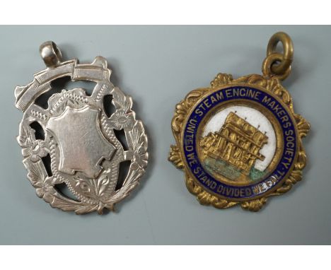 An Edwardian silver prize watch chain fob together with a Steam Engine Maker's Society enamelled fob