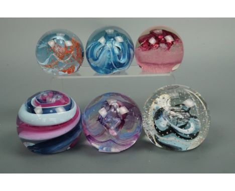 Six Caithness paperweights including Reflections 94, Dizzy and Moon Crystal