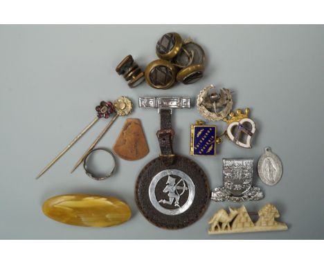 Sundry small collectables including an early 20th Century Edinburgh souvenir fob photo-book, an Egyptian carved bone brooch, 