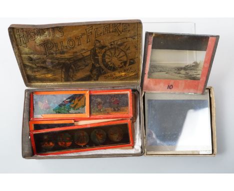 A group of Victorian magic lantern polychrome humorous strip slides and a small group of largely photographic topographical v